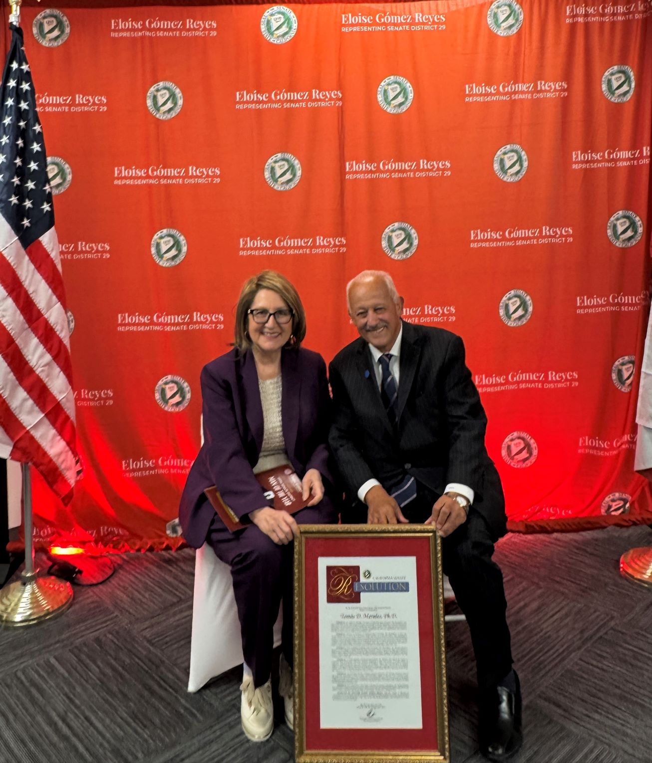 Senator Reyes sits with the 2025 Man of the Year